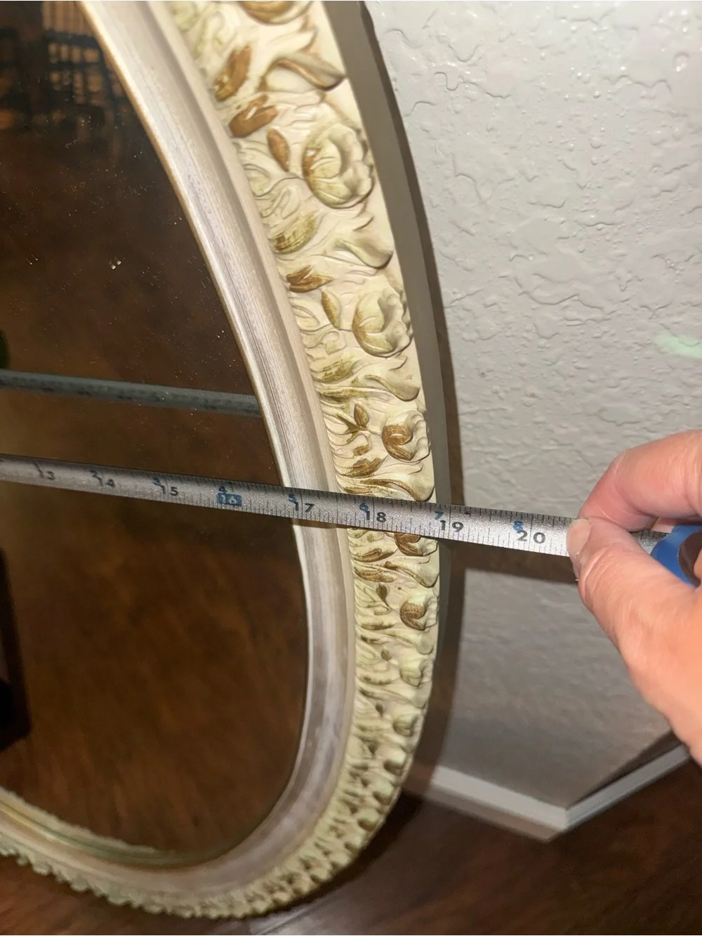 Vintage Oval Wall Mirror Featuring An Ornate, Off-White And Gold-Accented Frame